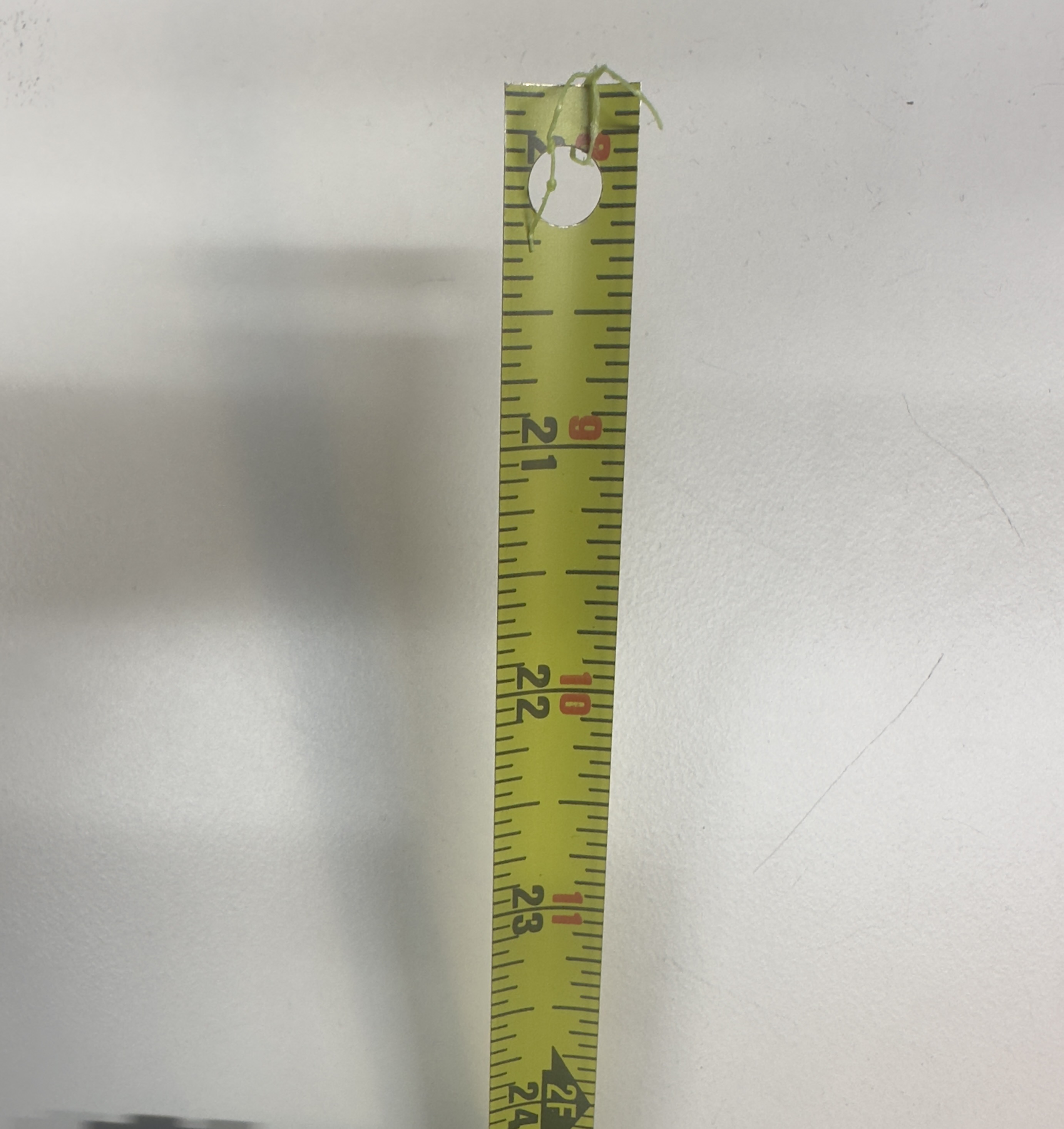 Figure 5.1a Hole made in the measuring tape